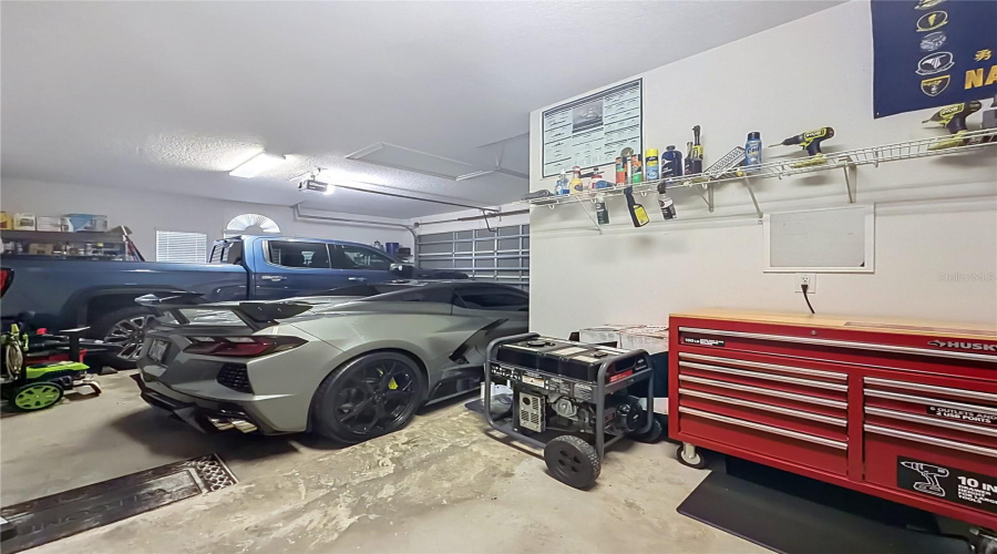 Second Of Two 2-Car Garages. Work Space/Flex Area, Garage Door Opener And Plenty Of Storage Space.