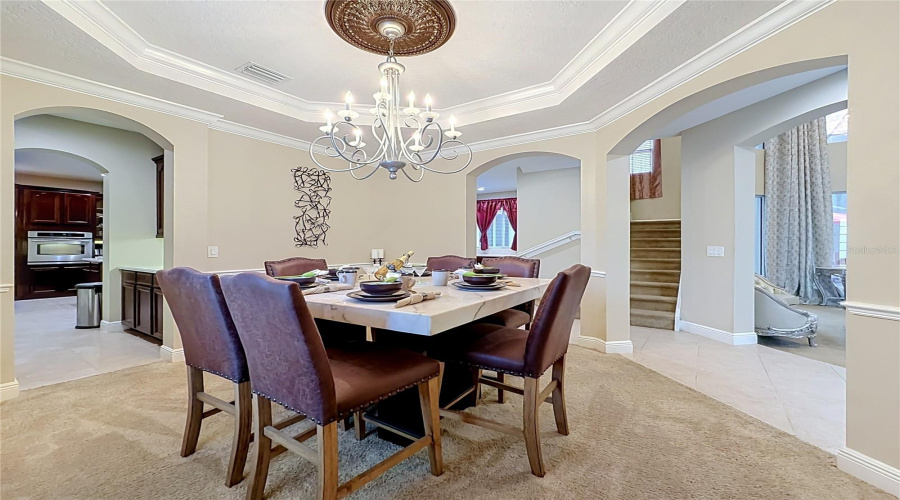 Formal Dining Area, Butler Pantry To Kitchen, Tray Ceiling, Crown And Chair Rail Moldings.