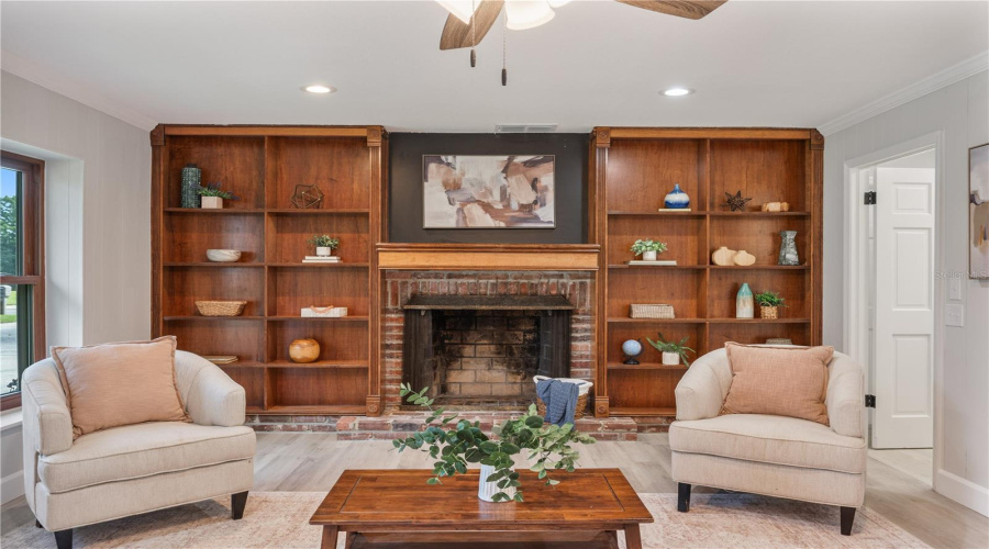 Family Room With Built-In Shelving And Fireplace