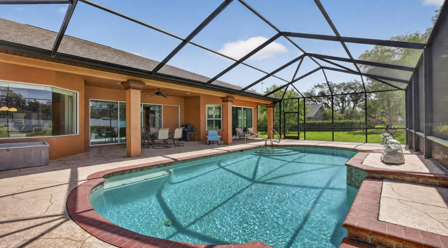 Screened Covered Pool With Waterfall
