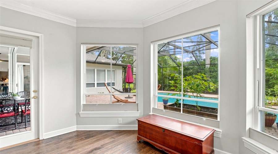 Primary Bedroom Windows And Lanai Door