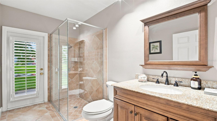 Bathroom 2 With Door Leading Out To Pool