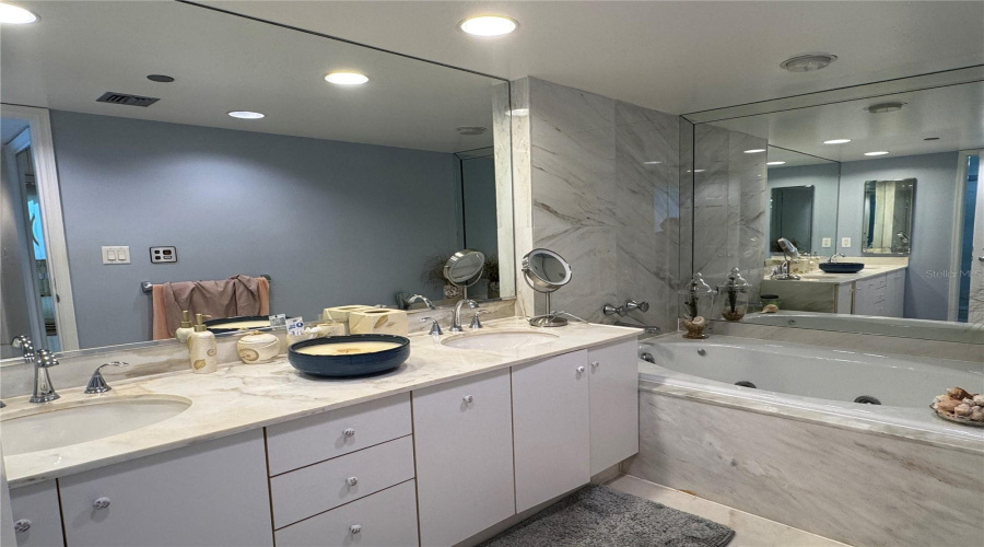 Primary Bathroom With Whirlpool Tub