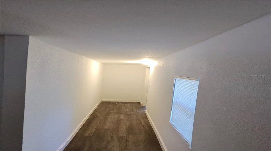 Hallway Leading To Back Of The Home