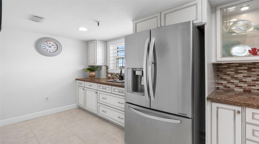Custom Cabinetry And Stainless Appliances