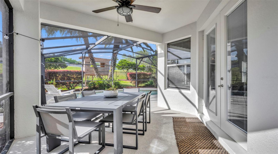 Outdoor Dining Space Overlooking The Pool