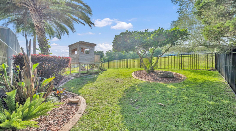 Fenced Backyard With Room For Kids To Play