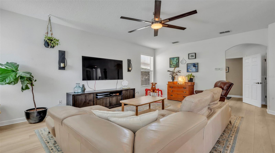 Living Room With Half Bath In The Background