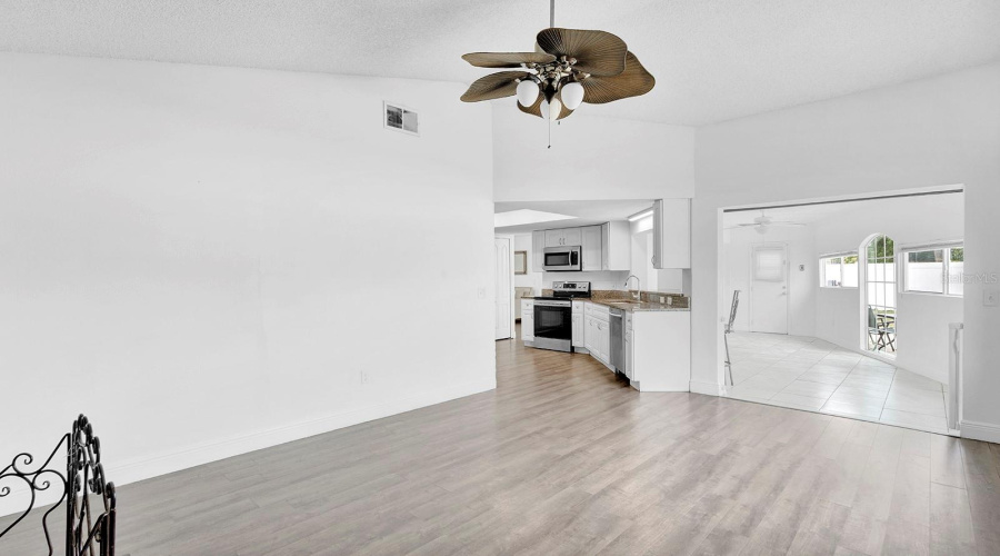 Family Room Looking Into Kitchen And Florida Room