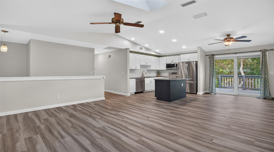 Living, Dining, Kitchen With Deck Access