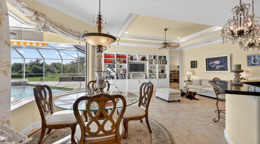 Enjoy Tranquil Views Of The Pool And Surrounding Acreage From The Breakfast Area, Perfectly Positioned Within The Home'S Spacious And Functional Floor Plan.