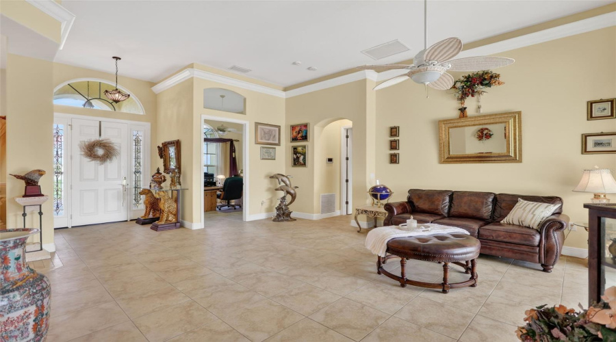 The Spacious Kitchen Offers Abundant Cabinetry, Extensive Workspace, A Center Island, Breakfast Bar Seating, And Seamless Connectivity To The Home'S Main Living Areas.