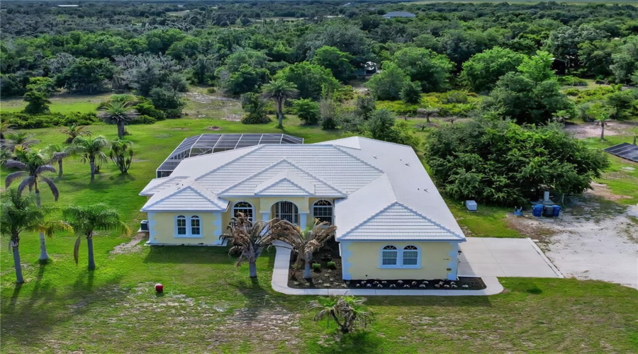 Custom-Built Mark Cahill Estate Situated On Nearly Six Fully Fenced Acres, Offering Exceptional Privacy, Mature Landscaping, And A Peaceful Natural Setting.