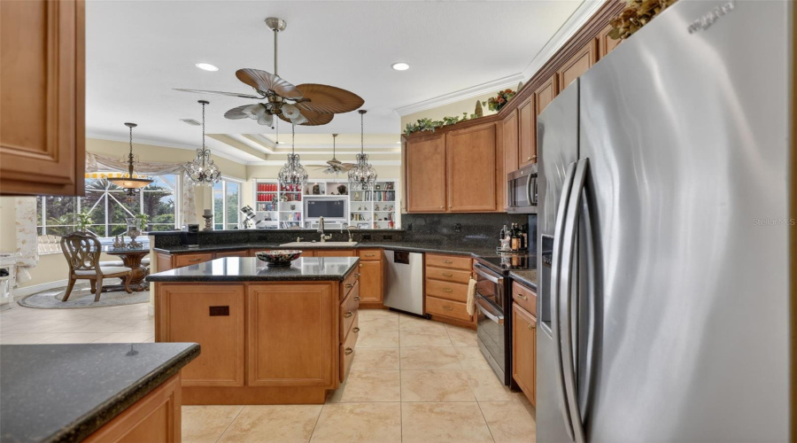 Enjoy Beautiful Views From The Kitchen While Preparing Meals In This Spacious And Thoughtfully Designed Gathering Space.