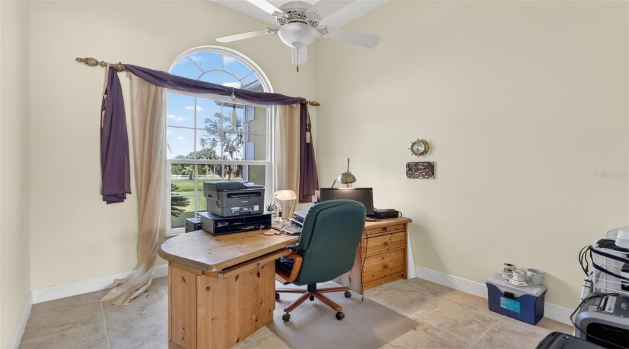 The Private Office Provides A Quiet And Comfortable Workspace With Soaring Ceilings, Abundant Natural Light, And Peaceful Views Of The Property.