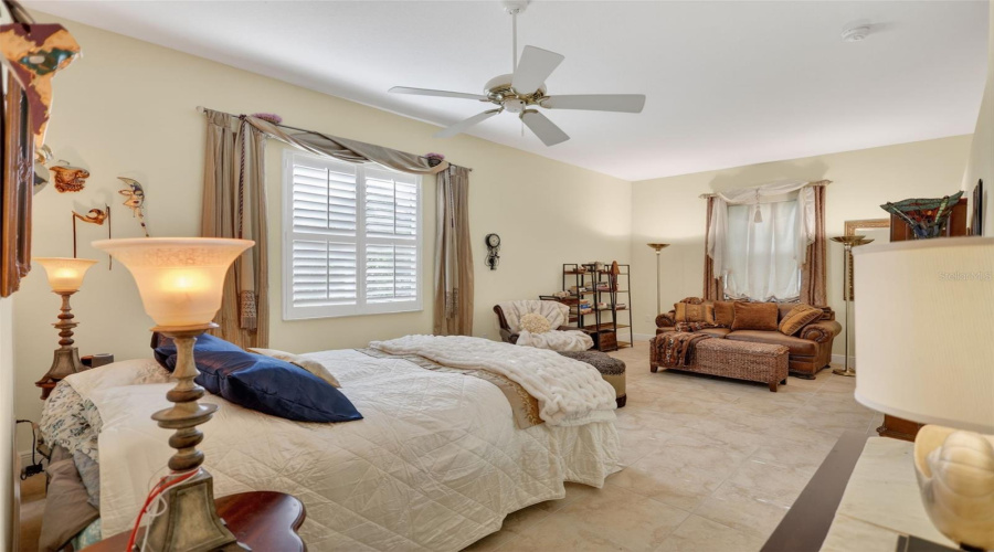 Generous Guest Retreat Featuring An Ensuite Bath With Direct Pool Access.