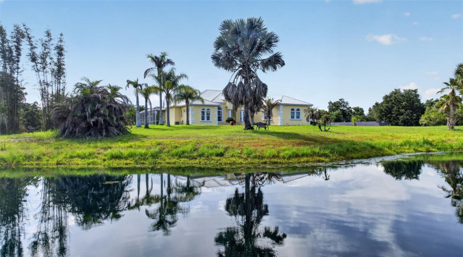 Enjoy The Tranquility Of Country Living With A Private Pond, Open Green Space, And A Beautifully Positioned Estate Designed To Maximize Privacy And Outdoor Enjoyment.