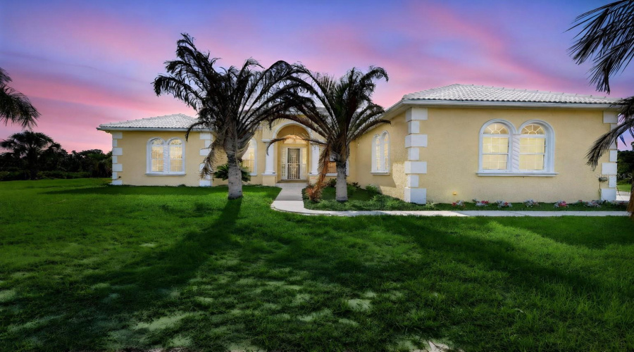Stunning Curb Appeal Highlighted By Elegant Architectural Details, Mature Landscaping, And The Timeless Craftsmanship Of This Custom-Built Estate Home.