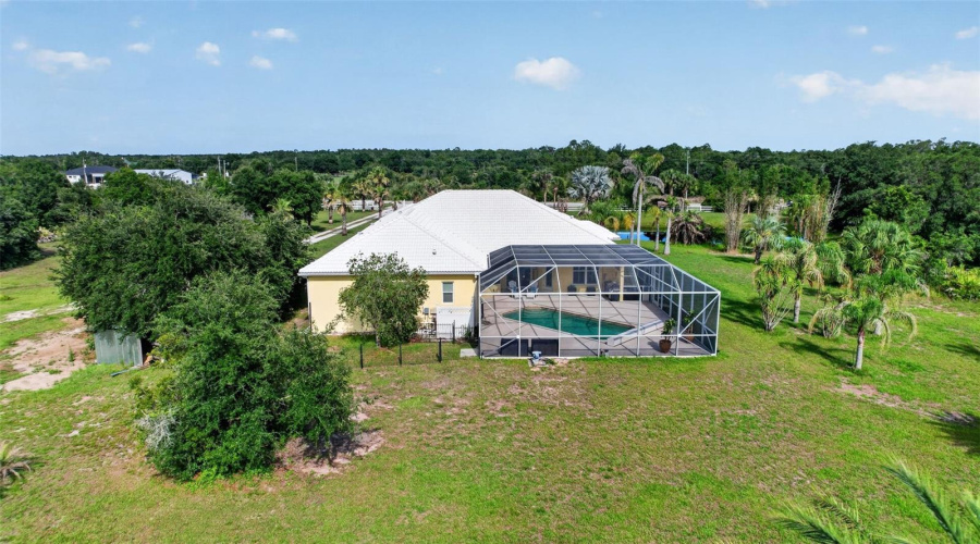 Surrounded By Lush Greenery And Open Acreage, This Estate Offers A Peaceful Retreat While Still Providing Convenient Access To Nearby Amenities.