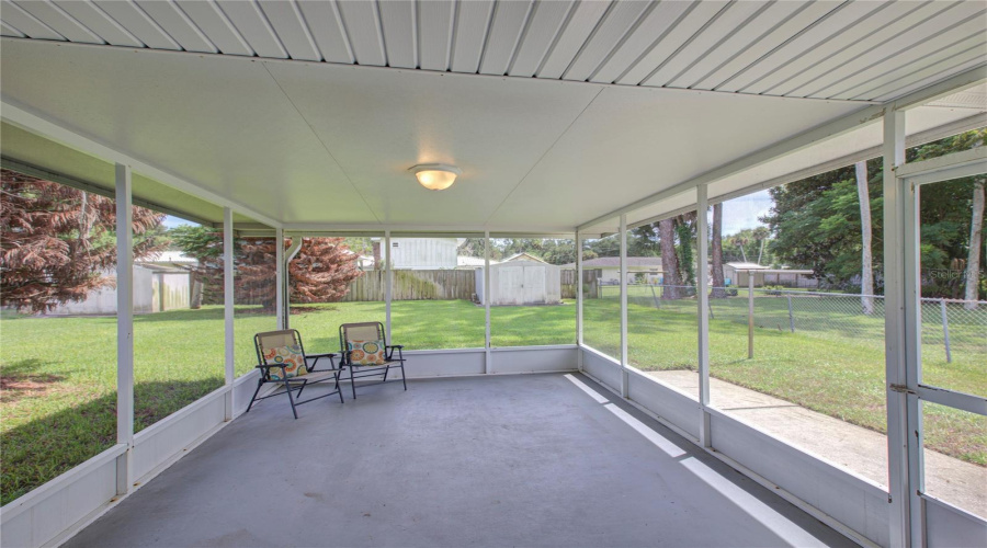 Screened Porch, Fenced Back Yard With 2 Utility Sheds