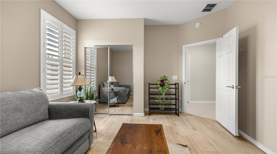 Guest Bedroom, Tile Flooring, Plantation Shutters, Organizer Closet