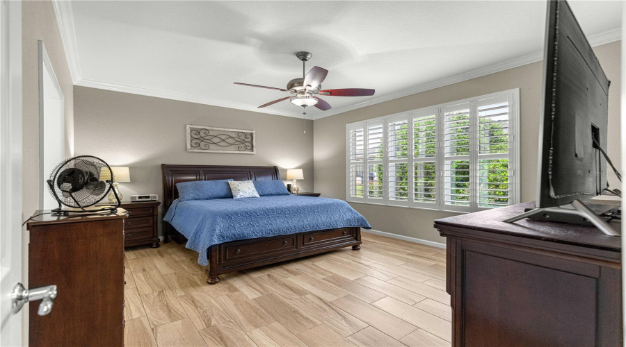 Primary Bedroom, Plantation Shutters, High Ceiling Tiles Flooring