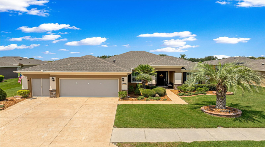 Updated Home, Newer Roof, Screen Garage Door, Exterior Painted, Lush Landscaping