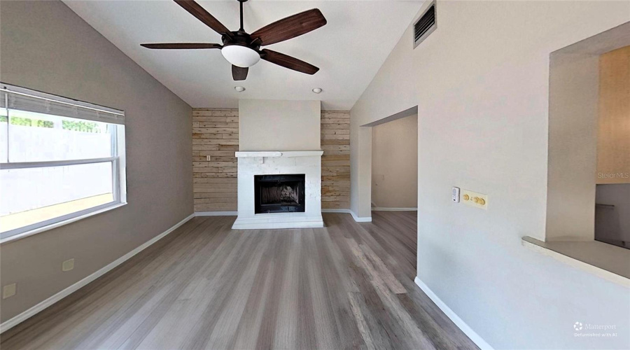 Family Room With Wood Burning Fireplace