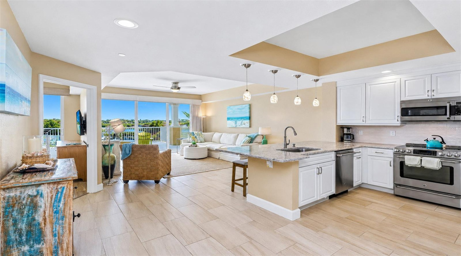 .. Front Of Unit By Intracoastal Waterway.. Tiled Plank Flooring Thru- Out All Liivng Area'S And Bathrooms. New Premier Luxury Vinyl Flooring In Bedrooms..