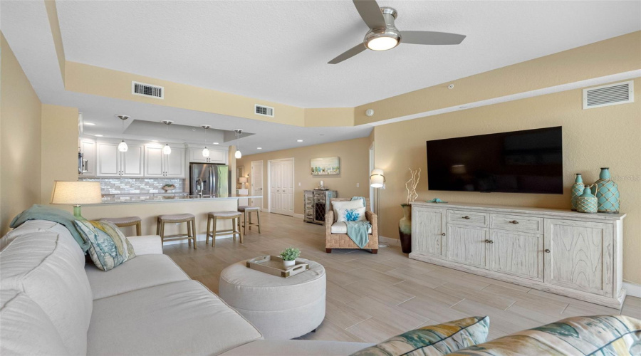 .. Photo Without Rug To Show Wood Plank Tile Thru -Out All Living Areas &Amp; Bathrooms.. All 3 Bedrooms Have New Luxury Vinyl Flooring.