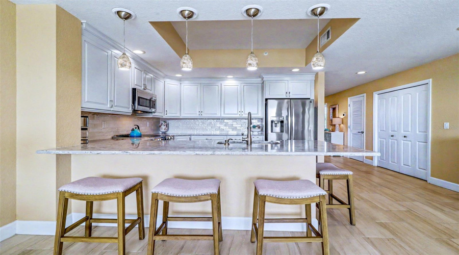 ... 11.5 X 10' Completely Remodeled Kitchen #1.. Oversized Quartz Countertops - Pendant Lighting ..