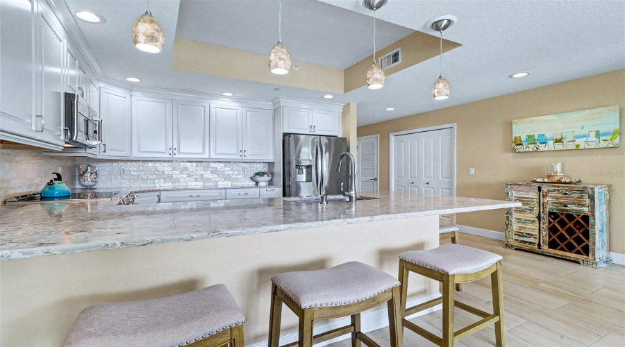 .. Kitchen Shot #2.. Kraftmaid 42&Quot; Cabinetry With Pearlized Subway Tile Back Splash. Open Flooplan From Kitchen Out.
