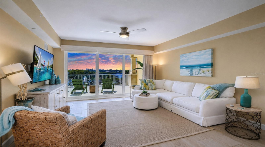 ... Living Room View.. Beautiful Twilight Sunset Skies At The Dolphin Key.. Residence 202 Enjoys A Rare 30' X 20' Extended Balcony... 3 Bedroom 2 Bath With 1560 Sq Feet..