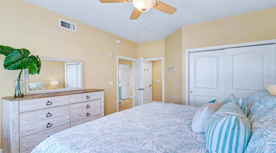 ... Guest Bedroom # One... Looking Out Towards Hallway And Guest Bathroom Entrance Thru Pocket Door. This Allows This Bedroom To Be En -Suite If Needed..
