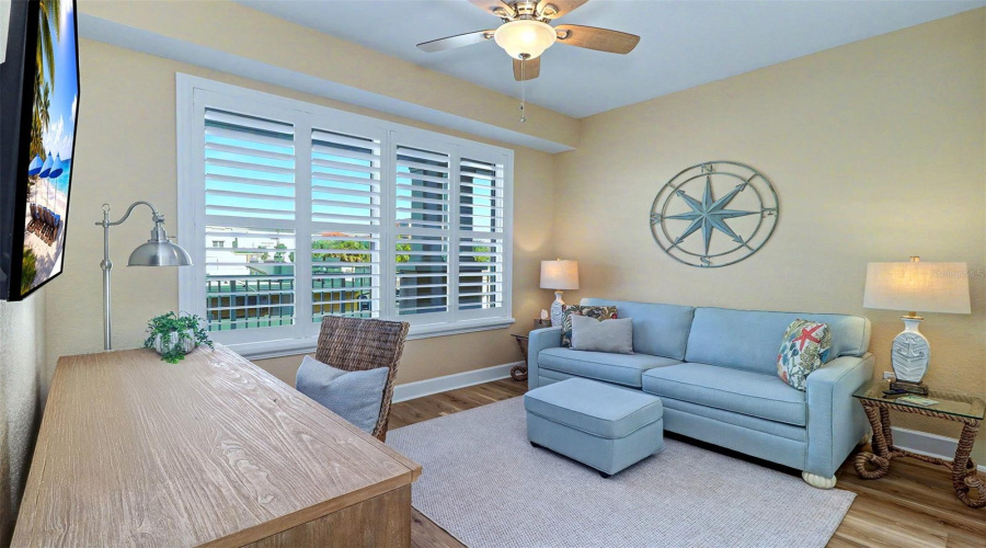 .. Guest Bedroom #2..New Plantation Shutters.. Currently Being Utilized As A Home Office.. Includes Sleeper Sofa And Pottery Barn Desk With 3 File Drawers. Note: Refer To Feature Sheet ..