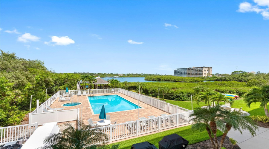 ....Photo Of Heated Pool &Amp; Spa At Dolphin Key.. Kayak Storage To Right  Of Pool. Gazebo Behind Pool -Gas Grills At Front Of Pool..