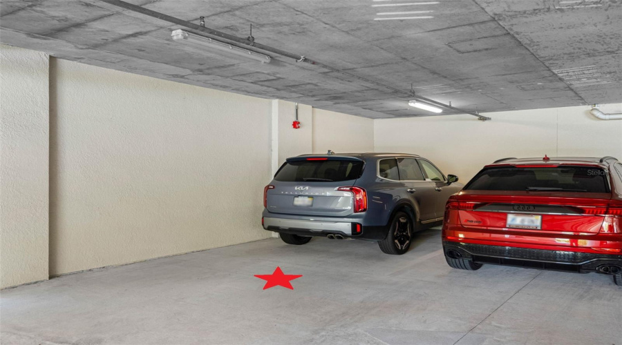 ... Garage Spot #1 Conveys With Unit ( Gray Suv In Spot ).. Spot Number Two Is Outside And Marked #43.. There Is Also Plenty Of Guest Parking.