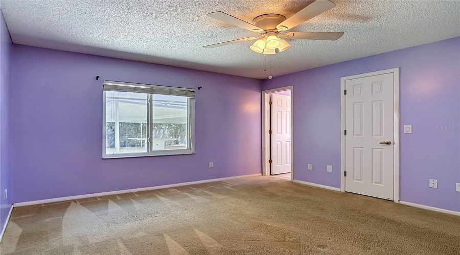 Primary Bedroom Opens To The Pool