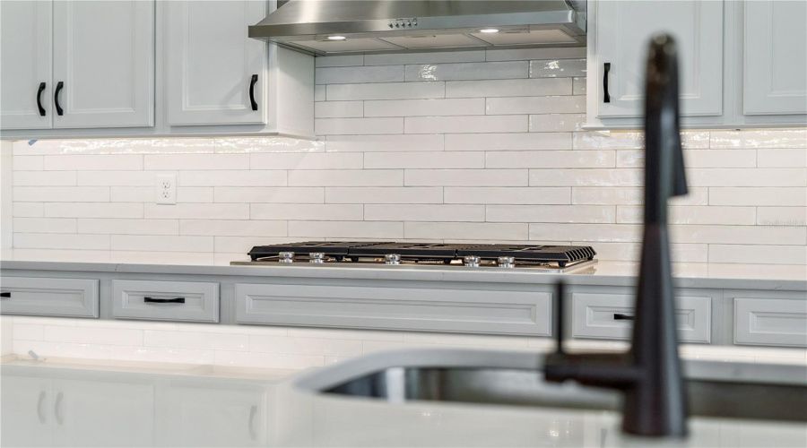 White Zellige-Style Backsplash