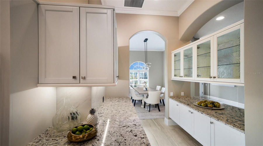 Butler Pantry Dry Bar Anchors The Dining Room, Kitchen And Living Areas