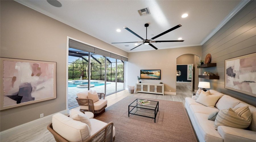 Disappearing Lanai Sliders Bring The Outdoors In To The Oversized Great Room