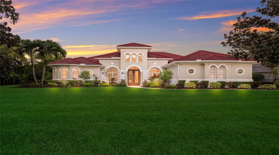 Private Lake Front Setting Off An Intimate Cul-De-Sac In The Sought-After Gated Community Of The Country Club Of Lakewood Ranch