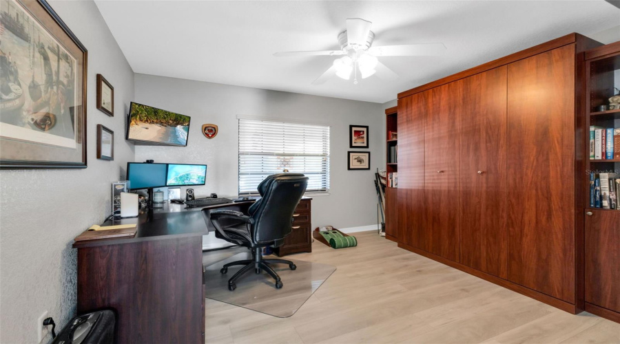Guest Bedroom With Desk And Murphy Bed System