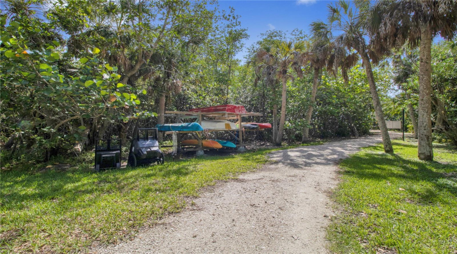 Path Leading To Fishing Pier And Boat Docks. Kayak Storage In Foreground. Docks Are Approved And All Assessments Paid For Rebuild In 2026