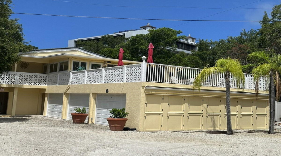 Bayfront Unit, Includes The Huge Patio Above Garage.