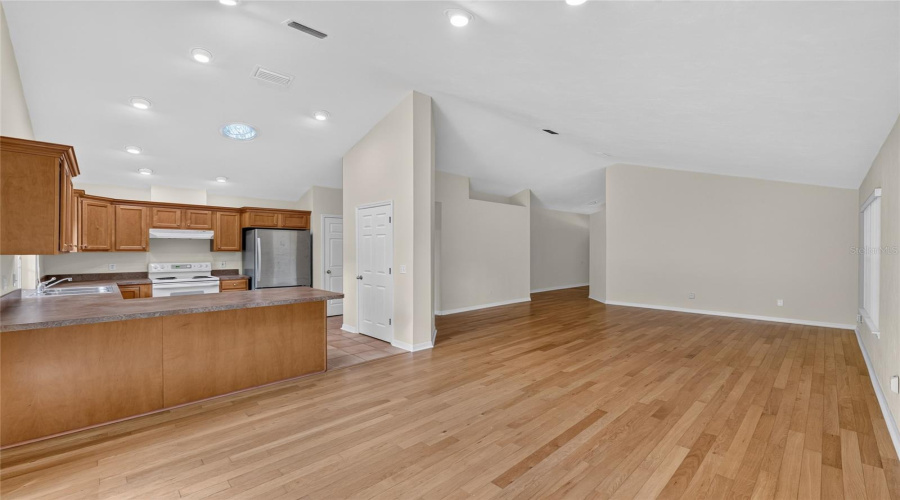 Dining And Kitchen Area With Great Room To The Back