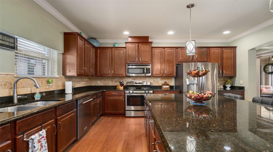 Kitchen With Granite Countertops And Stainless Appliances