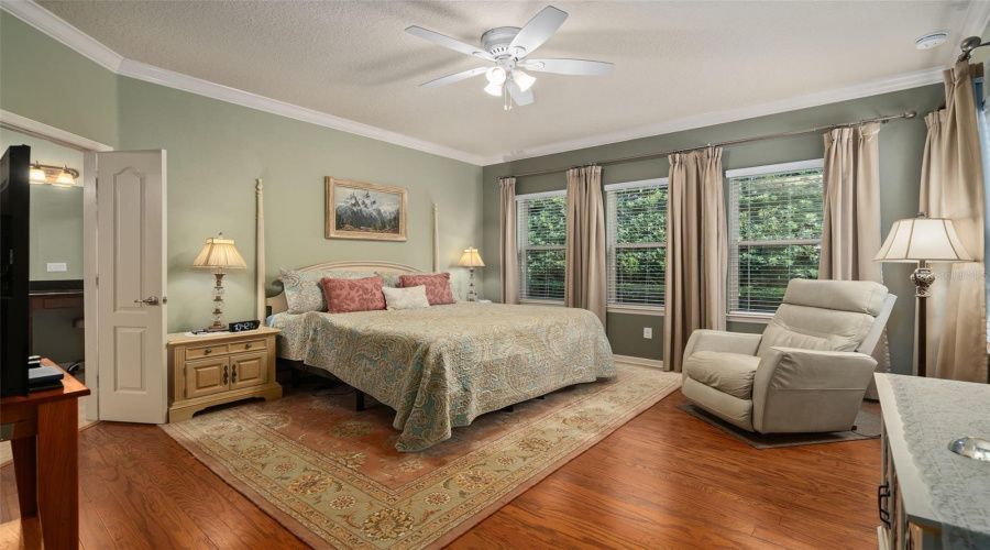 Primary Suite With Great Natural Light And Crown Molding