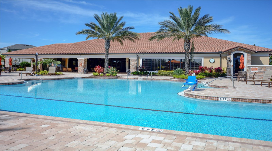 Amenities Pool With The Clubhouse In View