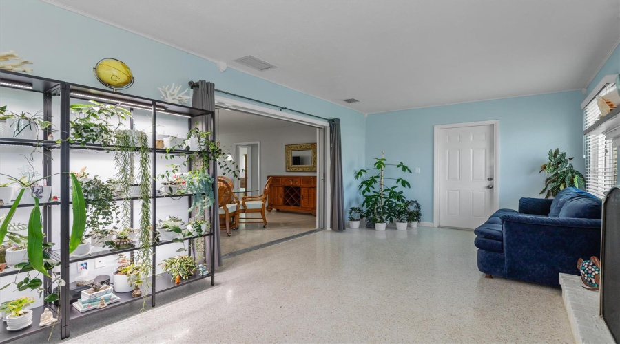 1/2 The Ac Back Room (Door Goes To Extra Storage Room, Opening To Dining Area